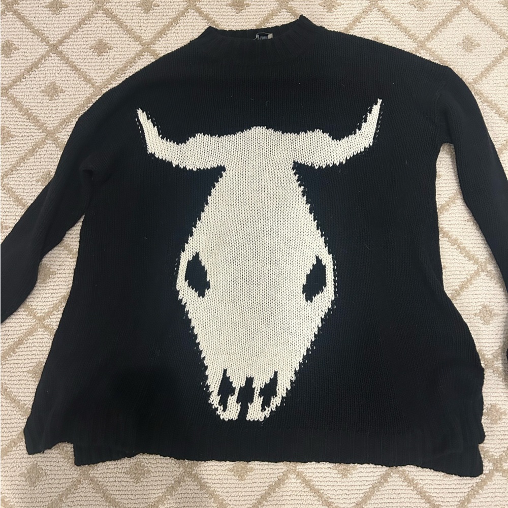 Show me your mumu black skull sweater. Worn twice. Great condition. Dry cleaned.